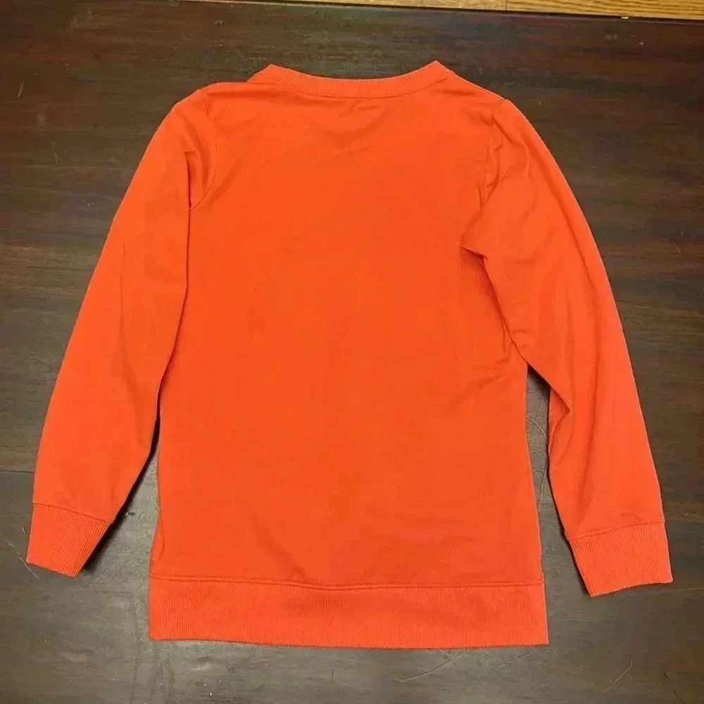 Nike tangerine colored girl’s sweatshirt size 6X